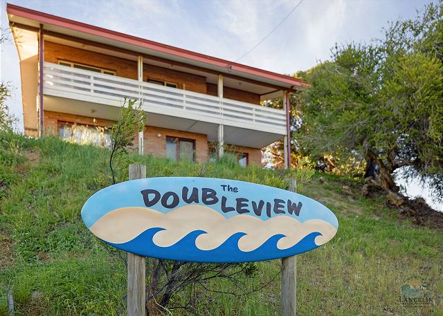 The Doubleview sign with house behind
