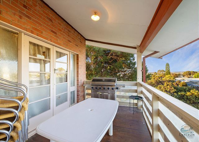 Front balcony with BBQ and town views
