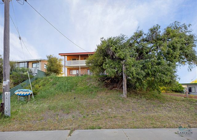Front street view of Double View with sign