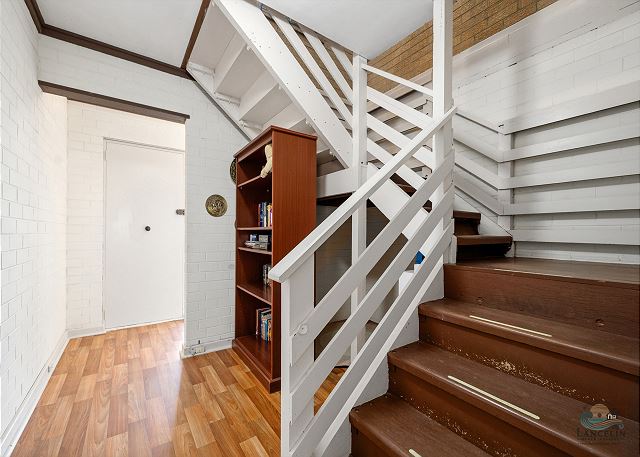 Timber staircase with bookshelf